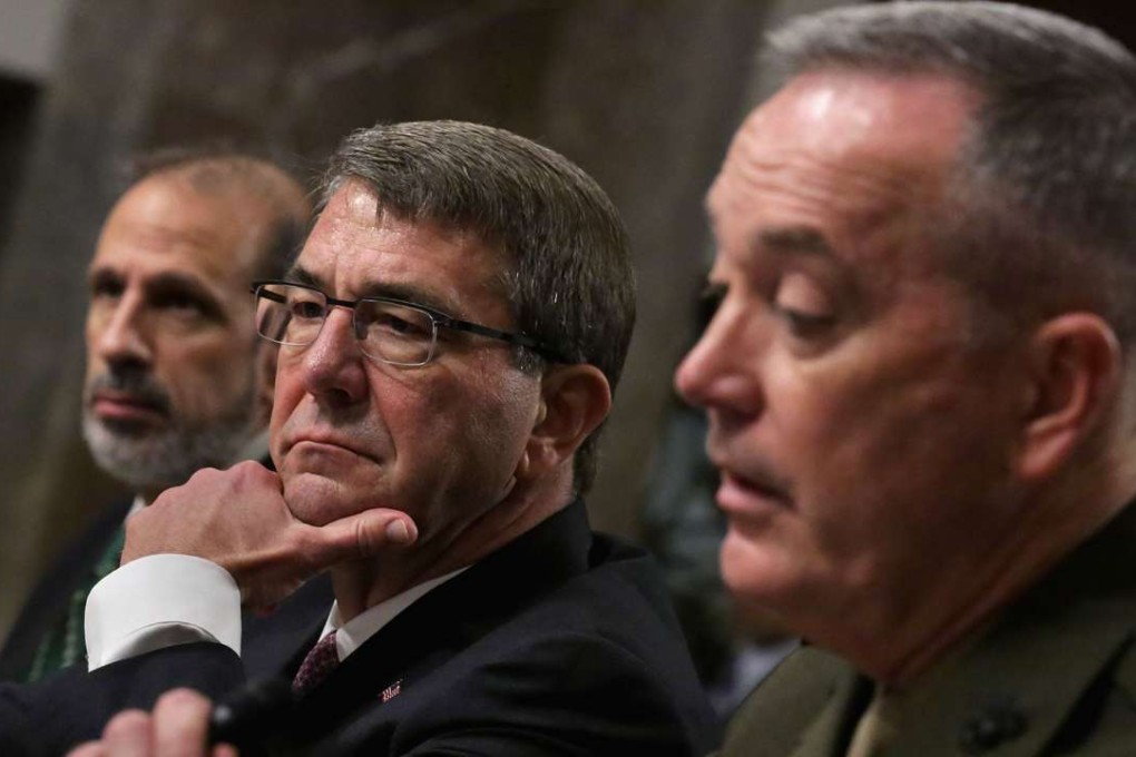 From left:US Defence Undersecretary/Comptroller and CFO Michael McCord, Defence Secretary Ashton Carter and Chairman of the Joint Chiefs of Staff General Joseph Dunford Jnr. Photo: AFP