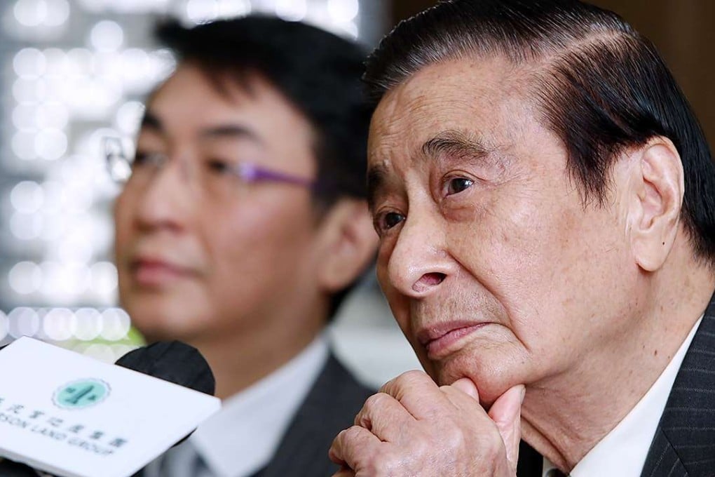 Henderson Land Chairman Lee Shau-kee talks to media after the annual result announcement at the Two IFC . Photo: Sam Tsang