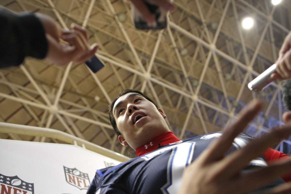 Buffalo Bills offensive lineman Ed Wang has visited Beijing as part of an NFL football clinic aimed at increasing interest in the sport in China. Photo: AP