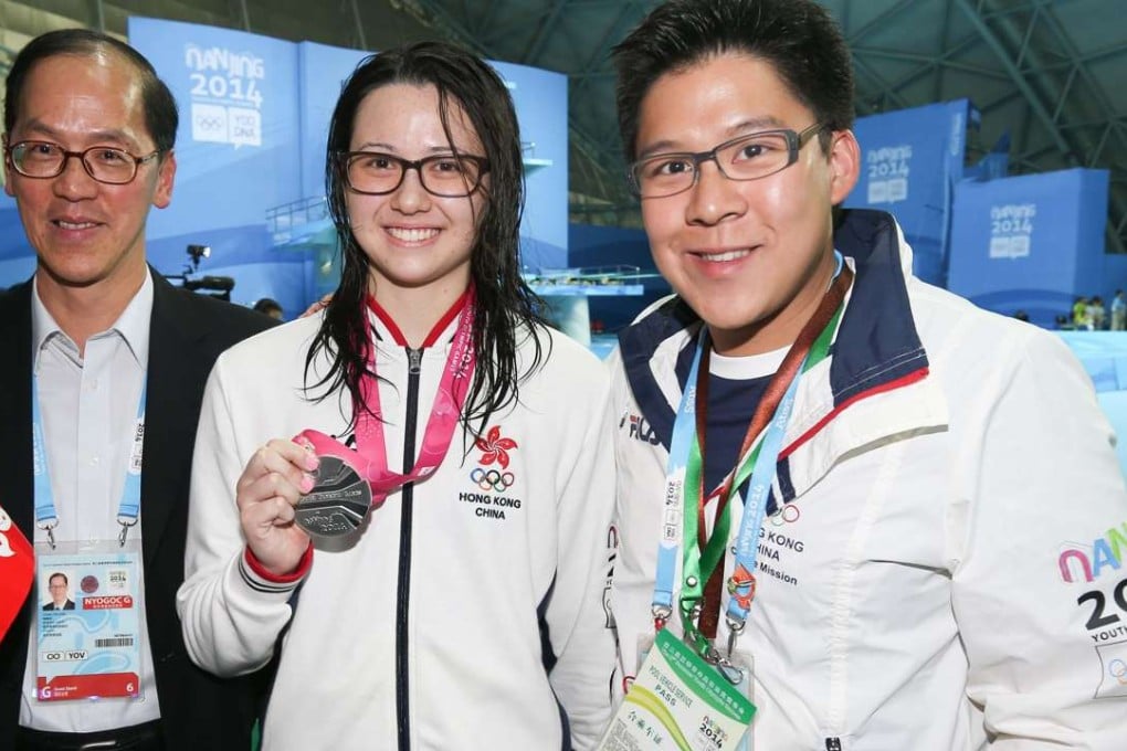 New Olympic Committee and Sports Federation vice-president Kenneth Fok (right) when he was chef de mission for the Hong Kong delegation at the Youth Olympic Games in Nanjing in 2014. He was pictured then with former Home Affairs Secretary Tsang Tak-sing and swimming star Siobhan Haughey. Photo: SCMP Pictures