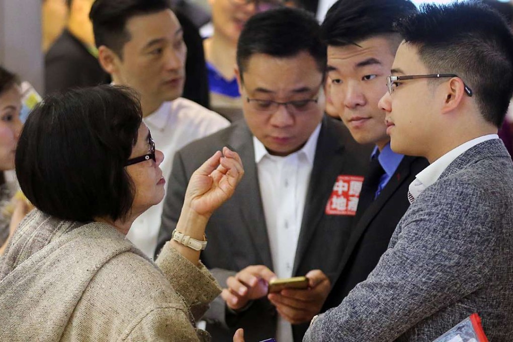 Potential buyers wait during Henderson Land's sale of Eltanin Square Mile at One IFC in Central in this photo dated October 31, 2015. Photo: Edward Wong