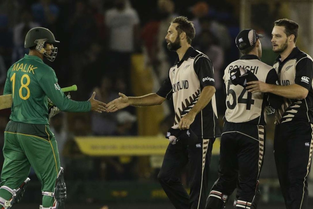 Pakistan’s Shoiab Malik congratulates New Zealand players after their convincing win at the World Twenty20. Photo: AP