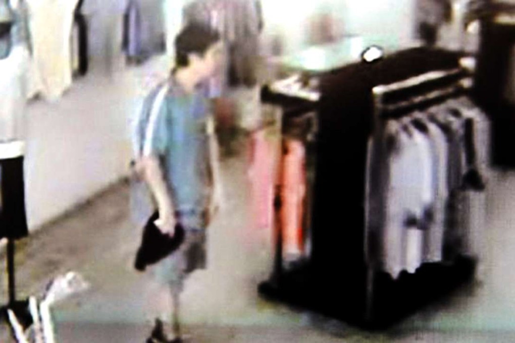Second time unlucky: The thief was caught red-handed on video the second time round. Photo: SCMP Pictures