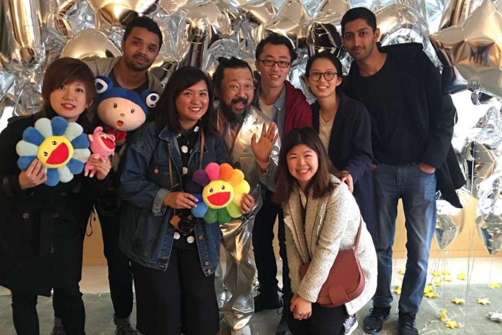 Takashi Murakami meets some of his Hong Kong followers at an ‘InstaMeet’ at a hotel suite in the city decorated with silver balloons this morning. Photo: Handout