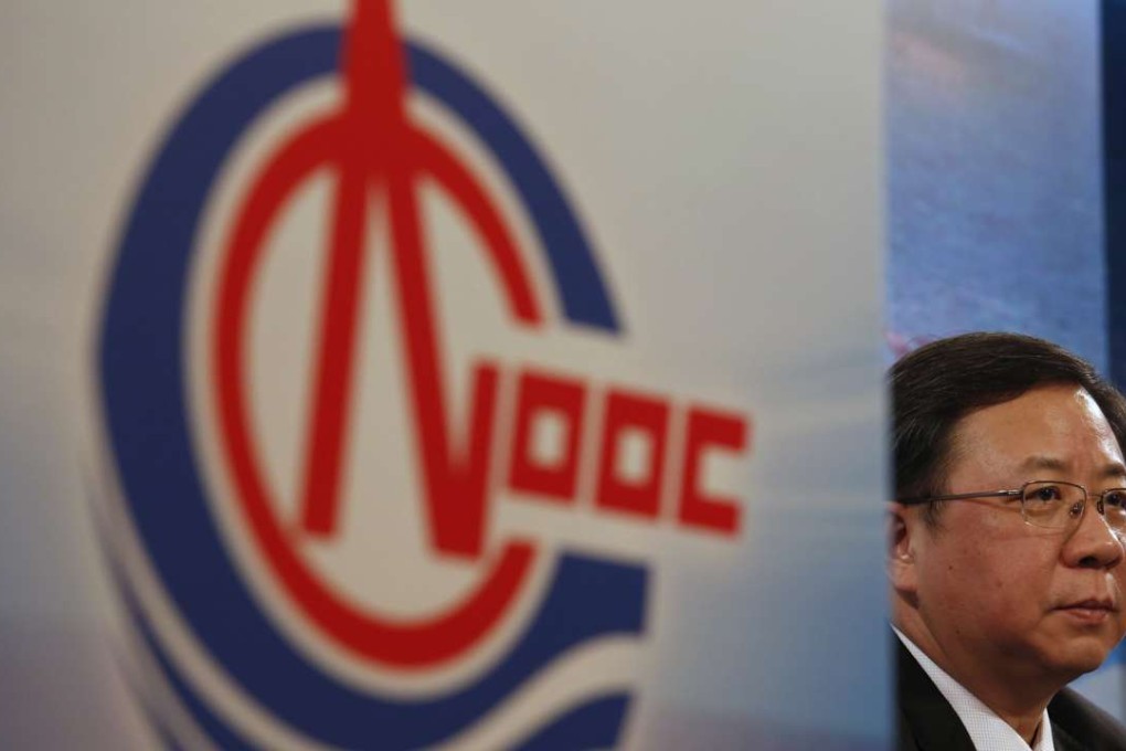 China National Offshore Oil Corporation (CNOOC) Chairman Yang Hua attends a news conference on the company's annual results in Hong Kong. Photo: REUTERS,Bobby Yip