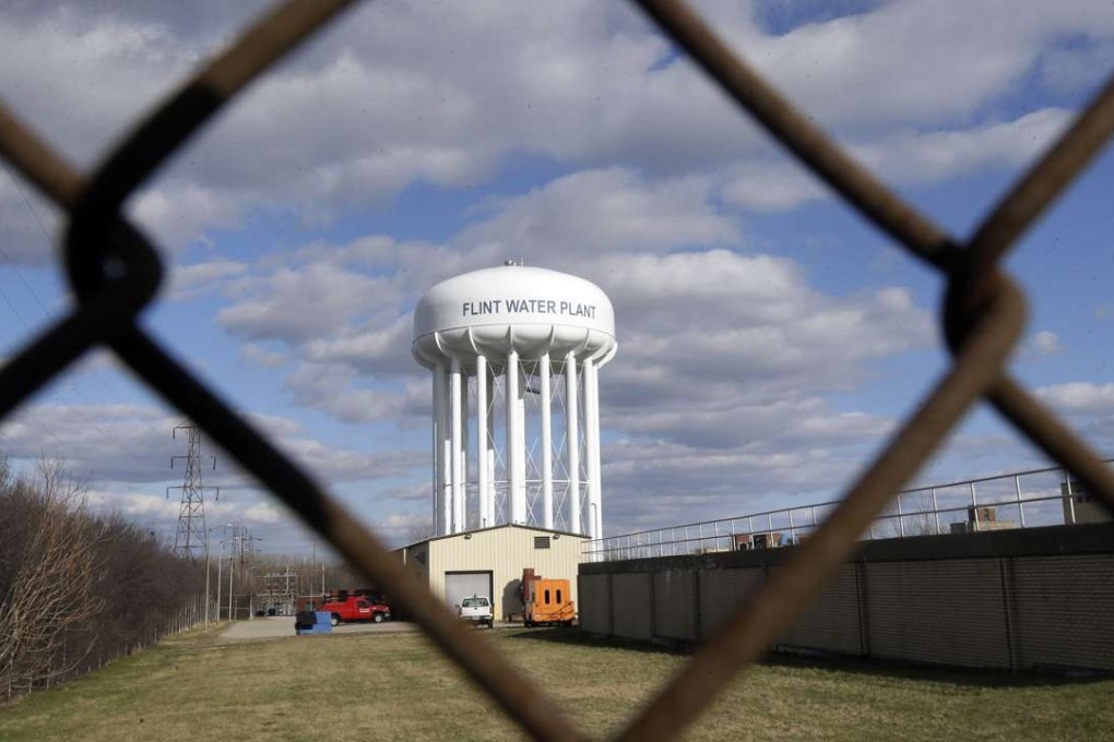 The water tower in Flint, Michigan, where a lead-contamination scandal has been blamed on all levels of government. Photo: AP