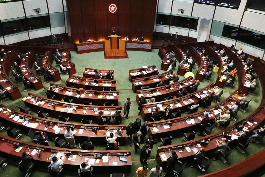 Pro-establishment legislators stage a bungled walkout as the pan-democrats vote against the government’s Beijing-backed political reform package for Hong Kong in 2015. Photo: SCMP Pictures