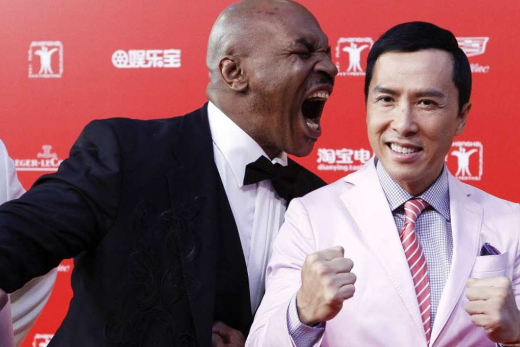 Ip Man 3 stars Mike Tyson and Donnie Yen at the opening ceremony of the Shanghai International Film Festival in 2015. The film’s Chinese distributor has since had its licence suspended for making up thousands of screenings in a huge box office fraud. Photo: AFP