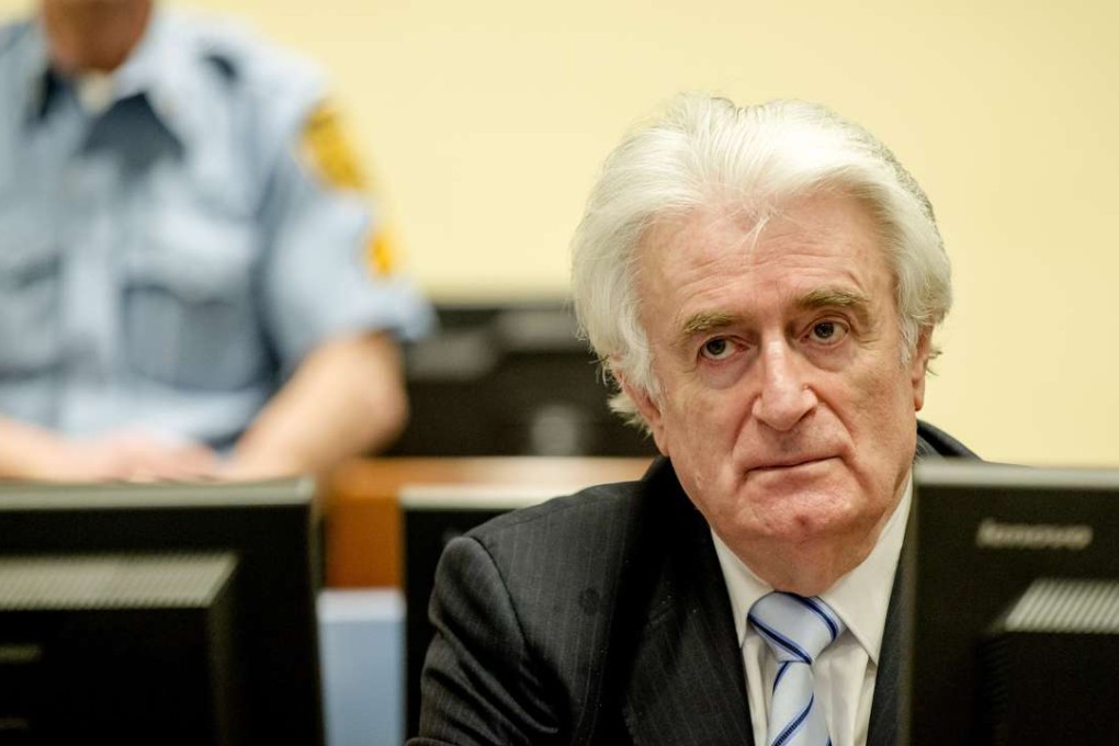 Bosnian Serb wartime leader Radovan Karadzic in the courtroom for the reading of his verdict at the International Criminal Tribunal for Former Yugoslavia (ICTY) in The Hague, The Netherlands on Thursday March 24, 2014. Photo: AP