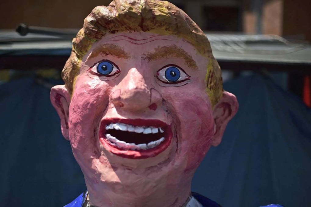 A papier-mache effigy of Donald Trump made by Mexican craftsman Felipe Linares is seen at his workshop in Mexico City on Thursday. Photo: AFP