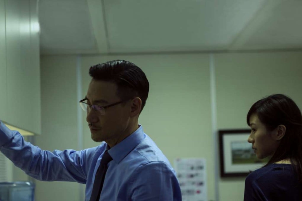 Jacky Cheung and Karena Lam play co-workers in Heaven in the Dark (Category IIB: Cantonese), directed by Yuen Kim-wai