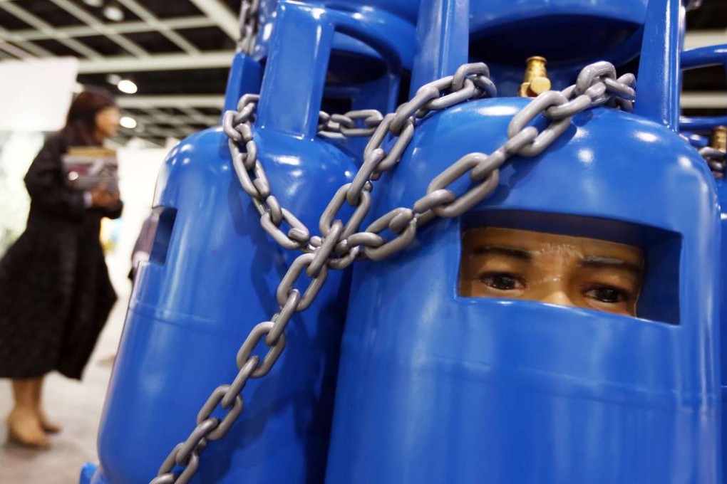 An art piece by Indonesian artist Eko Nugroho entitled ‘Hiercharchy of Prosperity #1’ is on display on the opening day of Art Basel in Hong Kong.