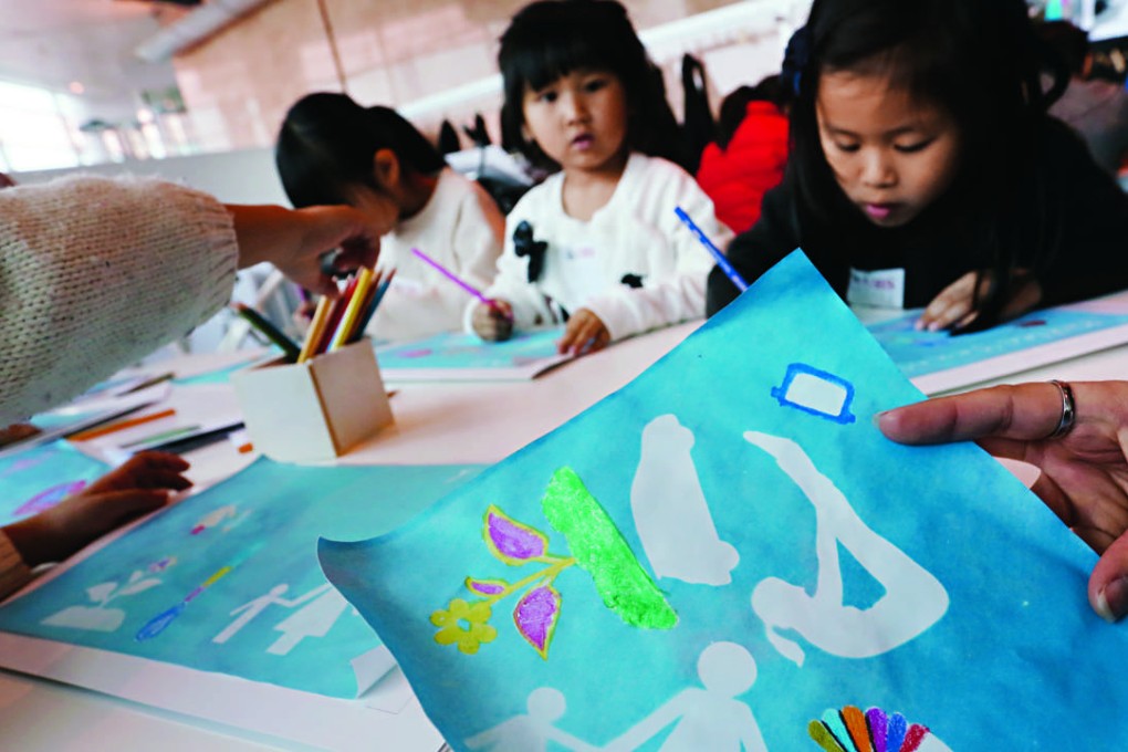Children take part in the junior art appreciation class at Art Basel. Photo: Jonathan Wong