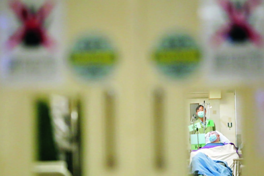 Due to overcapacity, some patients need to stay in beds in corridors, such as this one at Queen Elizabeth Hospital in Jordan. Photo: Sam Tsang