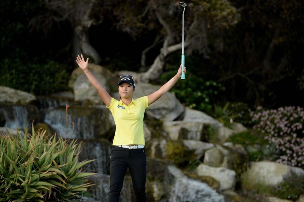Lydia Ko celebrates her birdie putt on the 18th hole in the final round. Photo: AFP