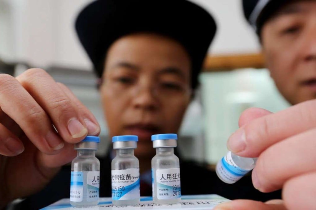 State Food and Drug Administration officials check the vaccines stored in the local Centre for Disease Control in Rong’an county, Guangxi Zhuang Autonomous Region, China. Photo: EPA