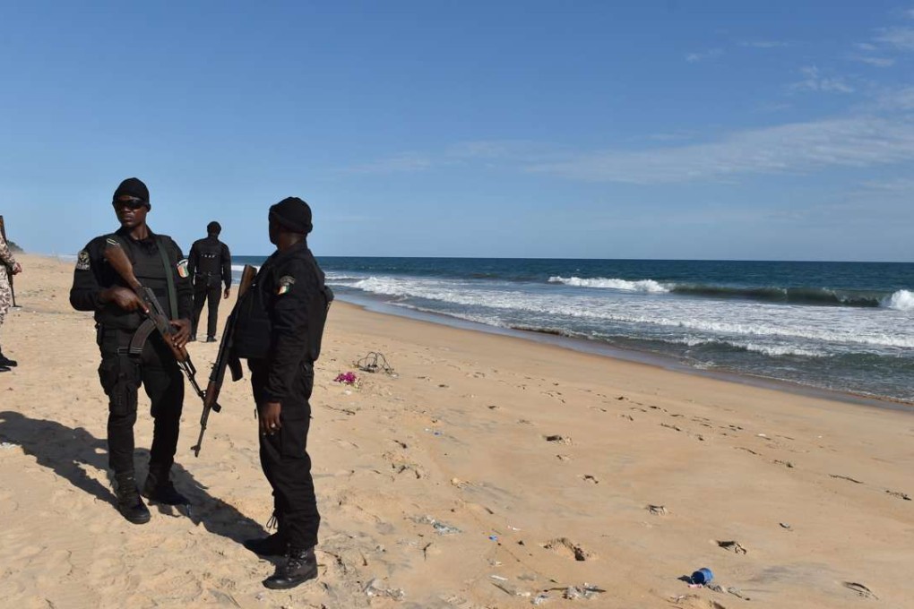 Ivory Coast police patrol a beach in Grand-Bassam on March 15, a day after a jihadist attack killed 19 people in the resort town. Photo: AFP