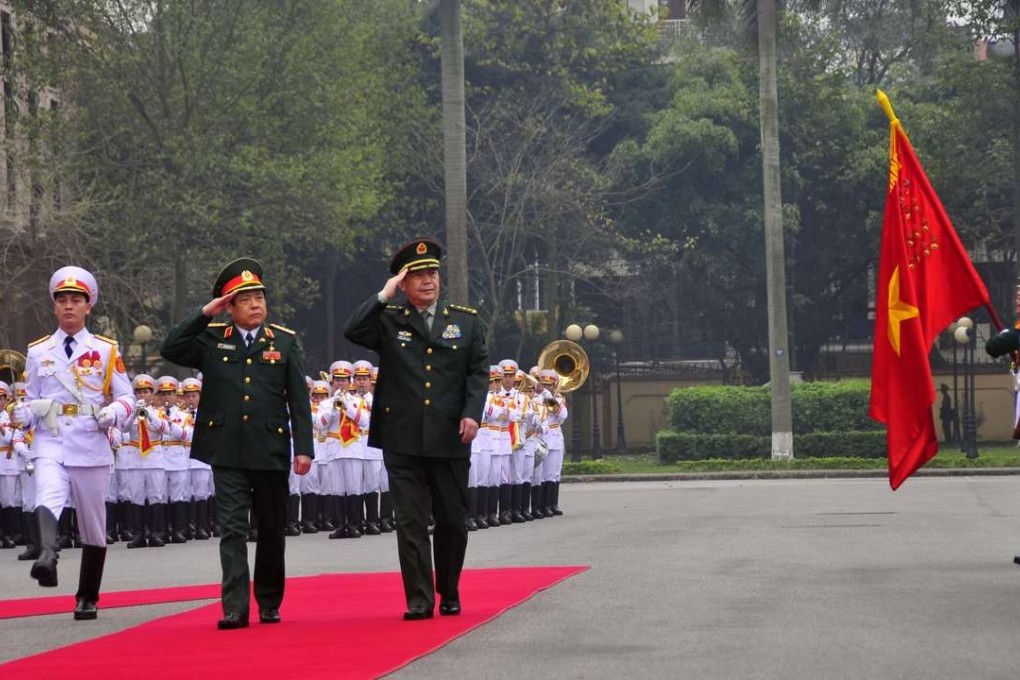 China, Vietnam vow to boost military ties amid strained relations over ...