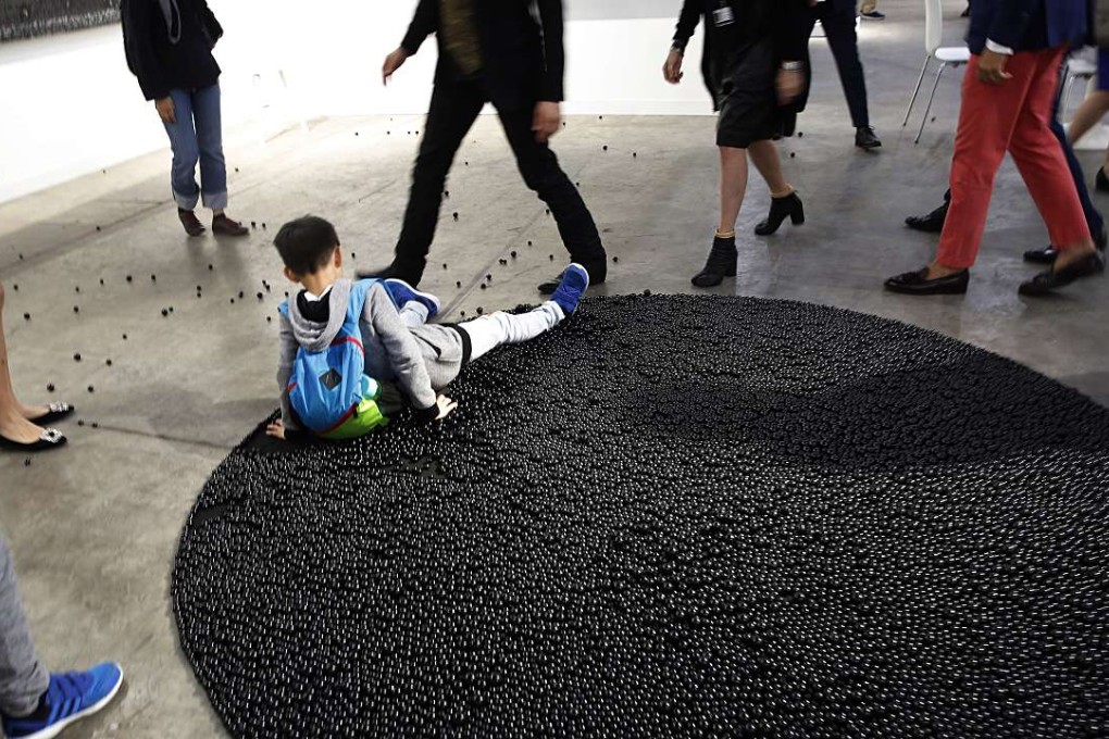 Some children did not give due reverence to the artworks on display at Art Basel. Photo: AP