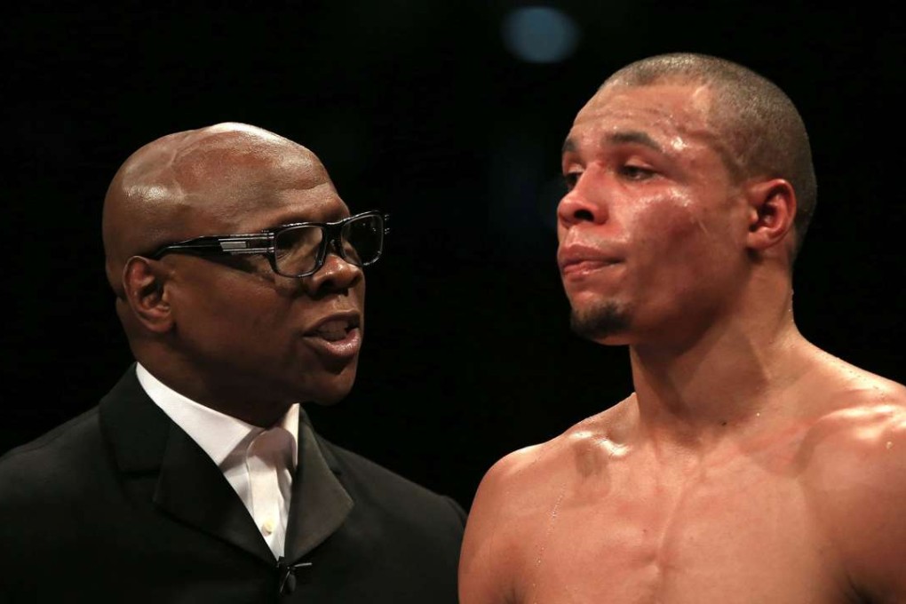 Chris Eubank Snr urged his son to go easy on his opponent once he saw the damage that was being done. Photo: AP