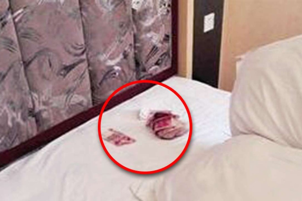The cash found in the hotel room. Photo: Sina.cn