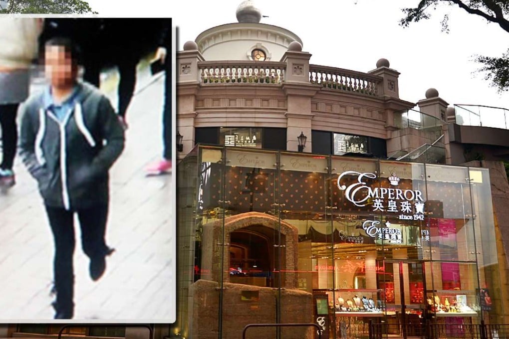 The young girl involved in the necklace theft is captured in CCTV footage near the Emperor jewellery shop in Tsim Sha Tsui. Photos: SCMP Pictures