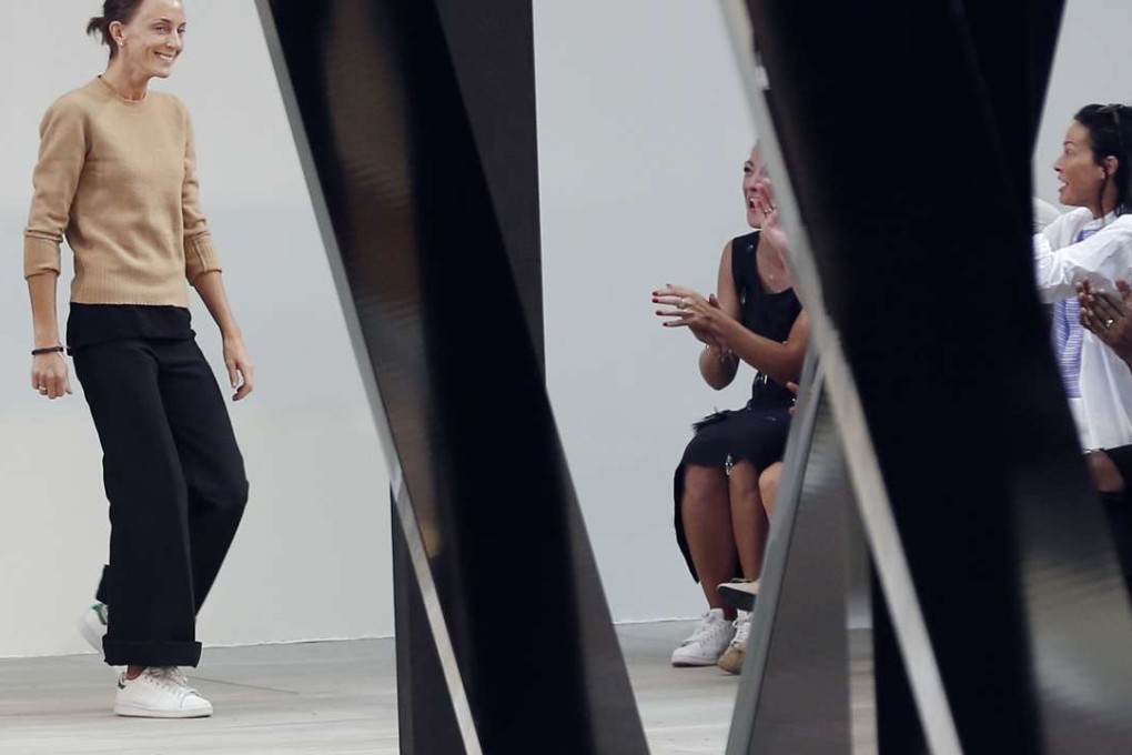 Designer Phoebe Philo wears white trainers. Photo: AFP