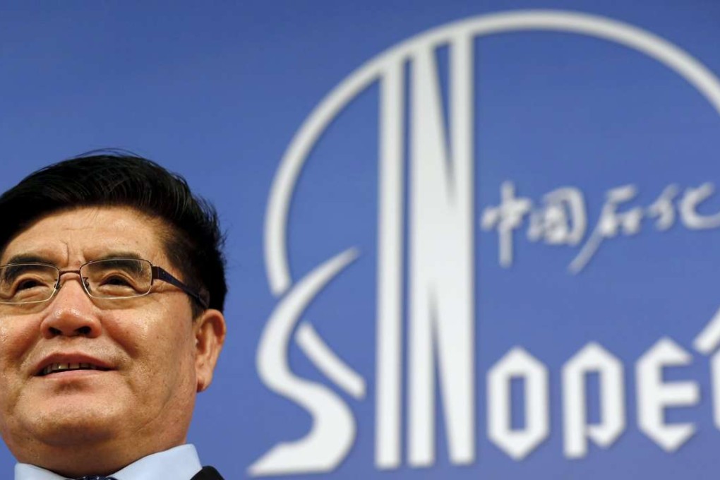 Sinopec Corp Chairman Wang Yupu attends a news conference on the company's annual results in Hong Kong, China March 30, 2016. REUTERS/Bobby Yip