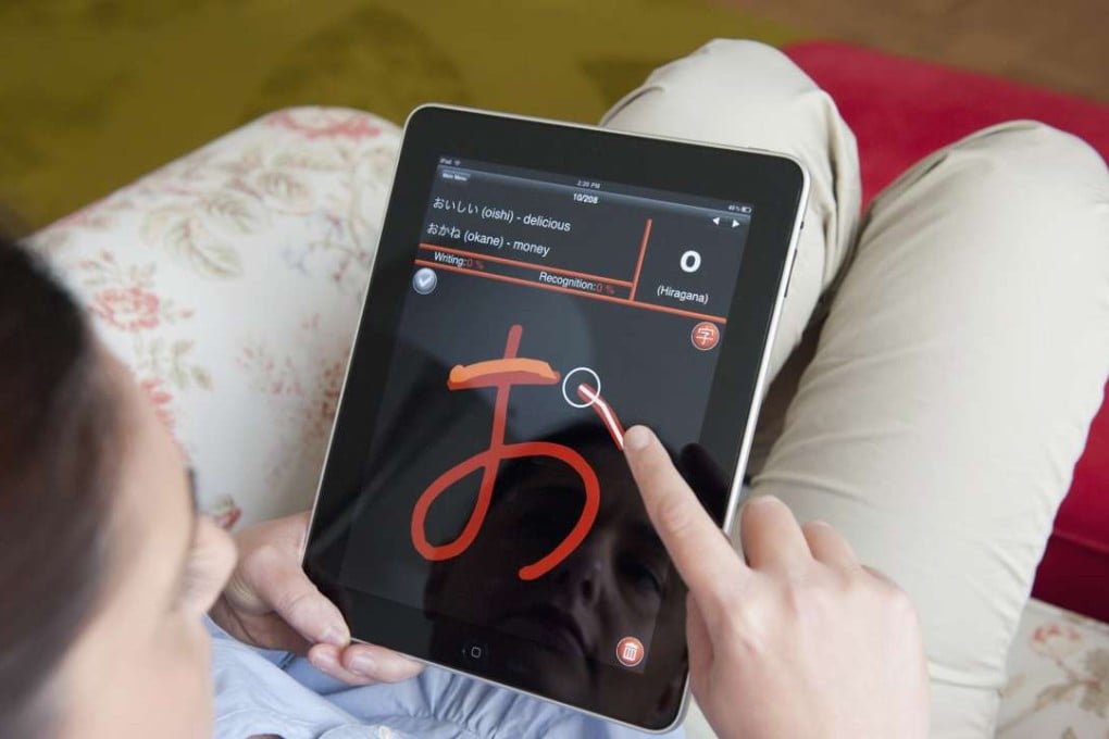 Mobile technology has transformed the way travellers learn the basics of foreign languages. Photo: Corbis