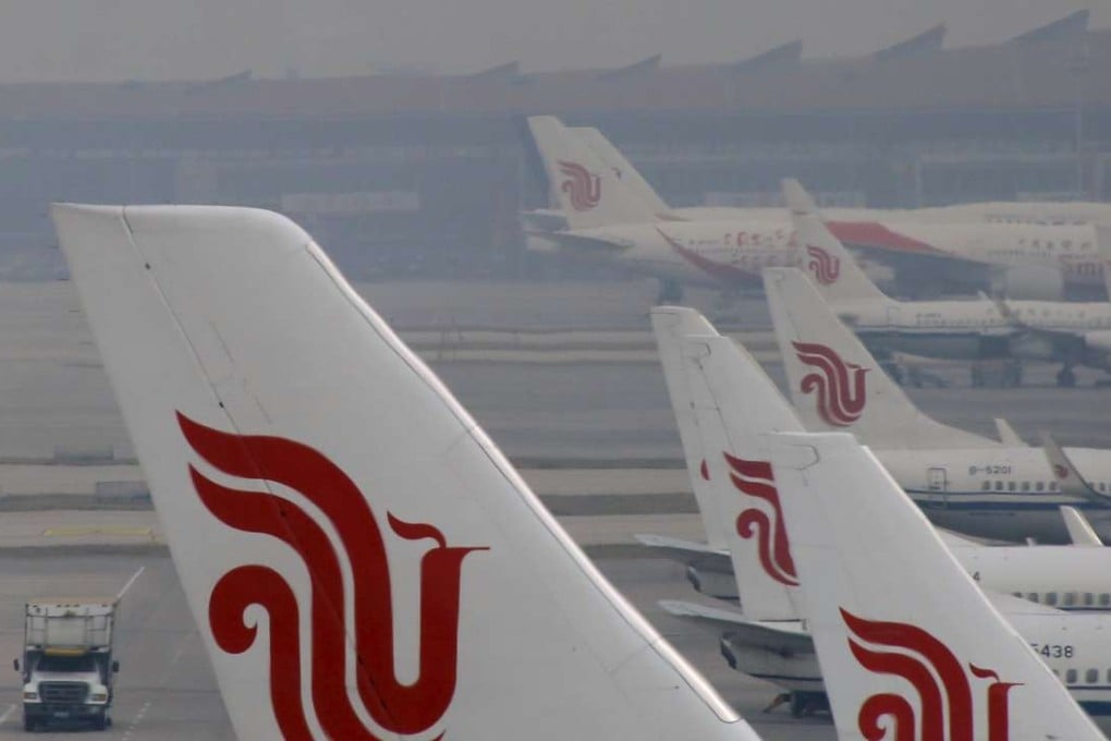 Flights of Air China are parked on the tarmac of Beijing Capital International Airport in Beijing. Photo: Reuters