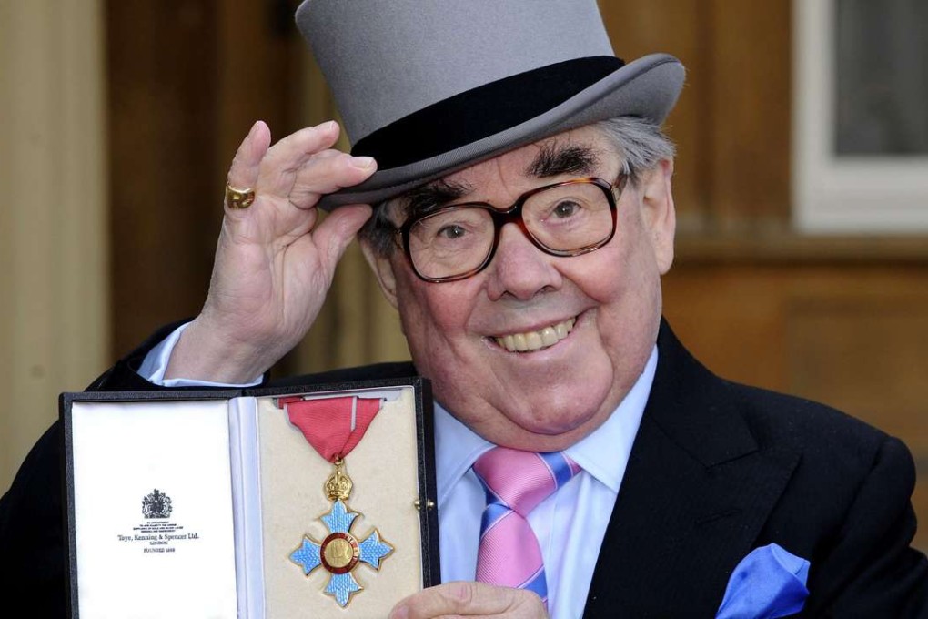 British comedian Ronnie Corbett after he received his Commander of the British Empire at Buckingham Palace. Photo: AP