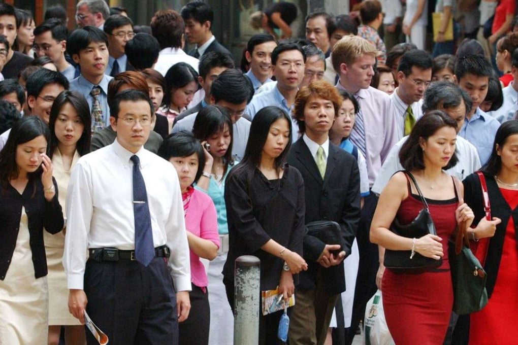 Office workers go out for lunch in the streets of Central. Photo: Edward Wong