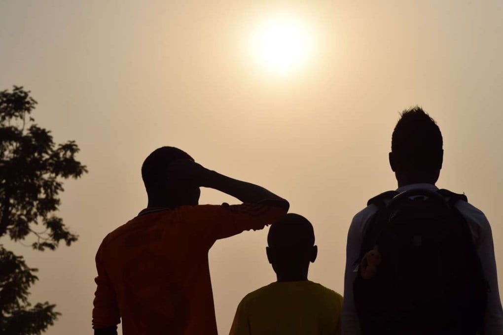Three children living in the camp for internally displaced people in Mpoko, Central African Republica, who claim to be victims or witnesses to sex abuse of minors by soldiers at the French Sangaris mission. Photo: Agence France-Presse