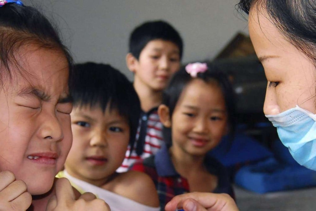 The government is limiting shots for non-local children in public health clinics. Photo: Reuters