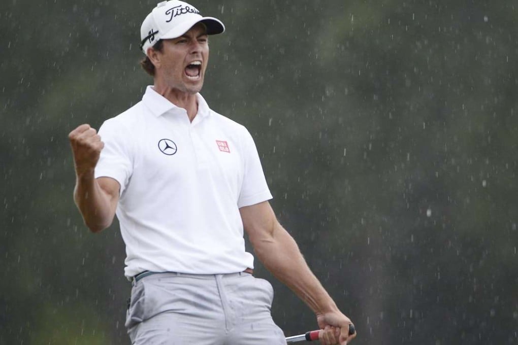 Adam Scott of Australia celebrates his birdie putt on the 18th hole that saw him win the 2013 Masters. Photo: EPA