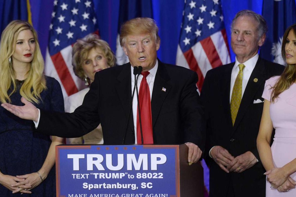 Republican presidential candidate Donald Trump, flanked by his daughter Ivanka, left, and his wife Melania Trump. Photo: TNS