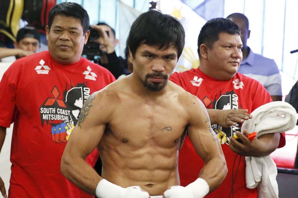 Manny Pacquiao, seen posing last month after a workout, was dropped by Nike following his comments. Photo: Reuters