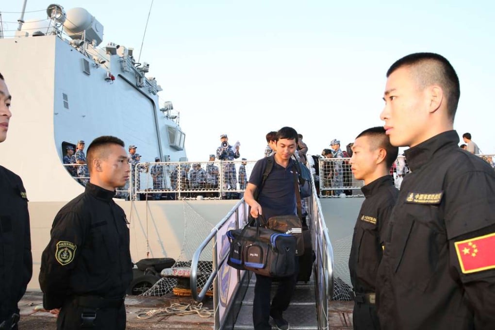 Chinese evacuees disembark from the PLA ship Linyi in Djibouti on March 31, 2015. More than 500 Chinese citizens were rescued from from conflict-ridden Yemen and transported to Djibouti, where China’s military will soon have a permanent presence. Photo: Xinhua