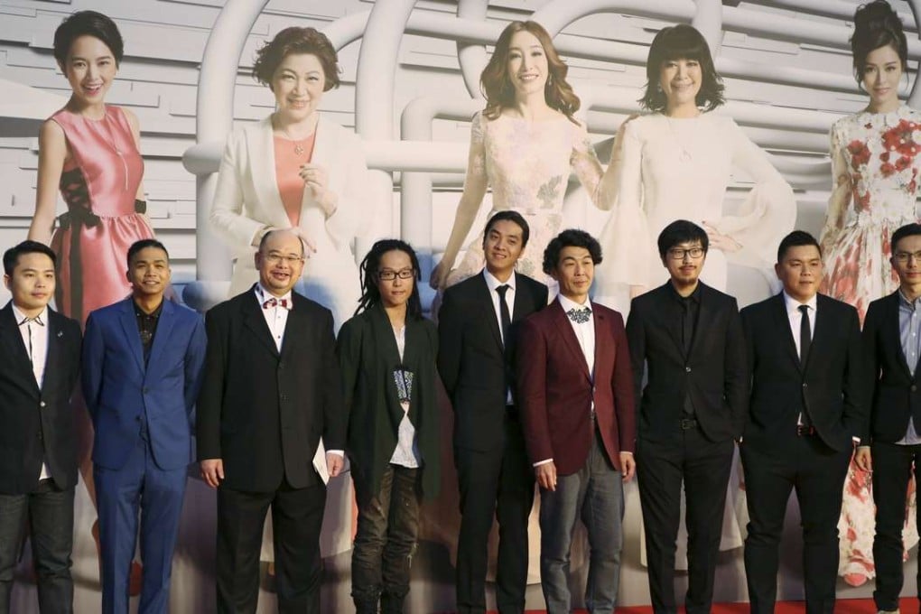 Executive producer Andrew Choi (2nd R) with directors and cast members of movie "Ten Years", winner of the Best Film award at the Hong Kong Film Awards. Photo: Reuters