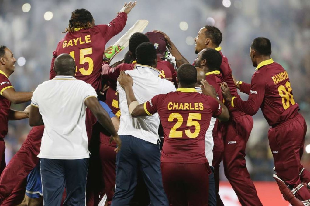 West Indies players celebrate after beating England in the final of the World Twenty20 tournament at Eden Gardens in Calcutta. Photo: AP