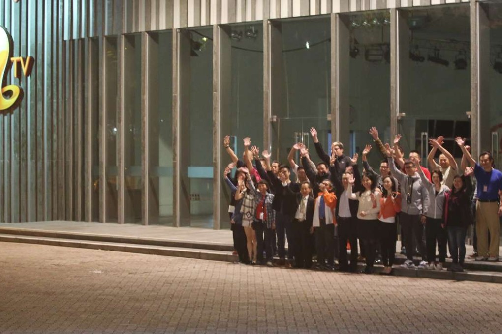 ATV staff say goodbye to media and fans after the station closed down at midnight on April 1. Photo: Edward Wong