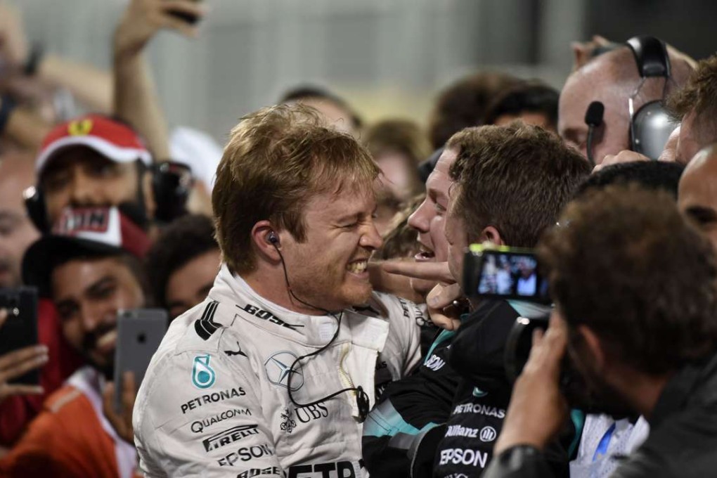 Mercedes German driver Nico Rosberg celebrates with teammates and fans after winning the Bahrain Grand Prix. Photo: AFP