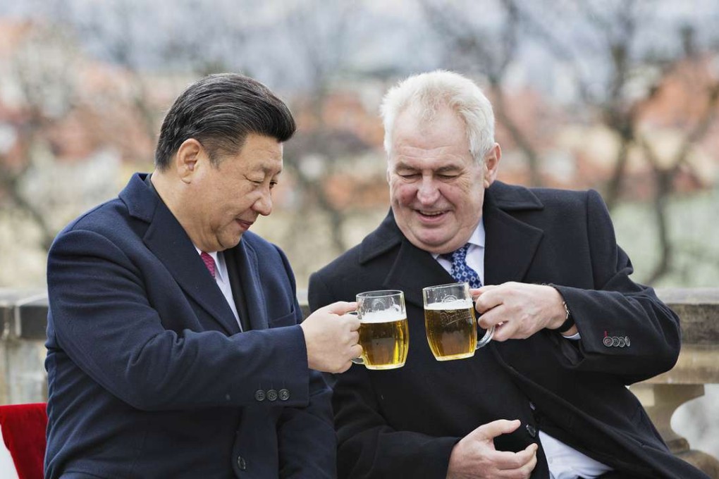 President Xi Jinping and Czech Republic President Milos Zeman toast a drink on the terrace of the Strahov Monastery in Prague. Photo: AP