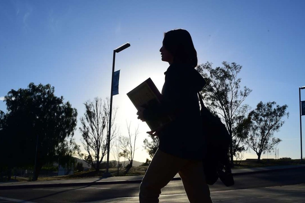 A Chinese student heads to choir practice at her high school in, California. Photo: AFP