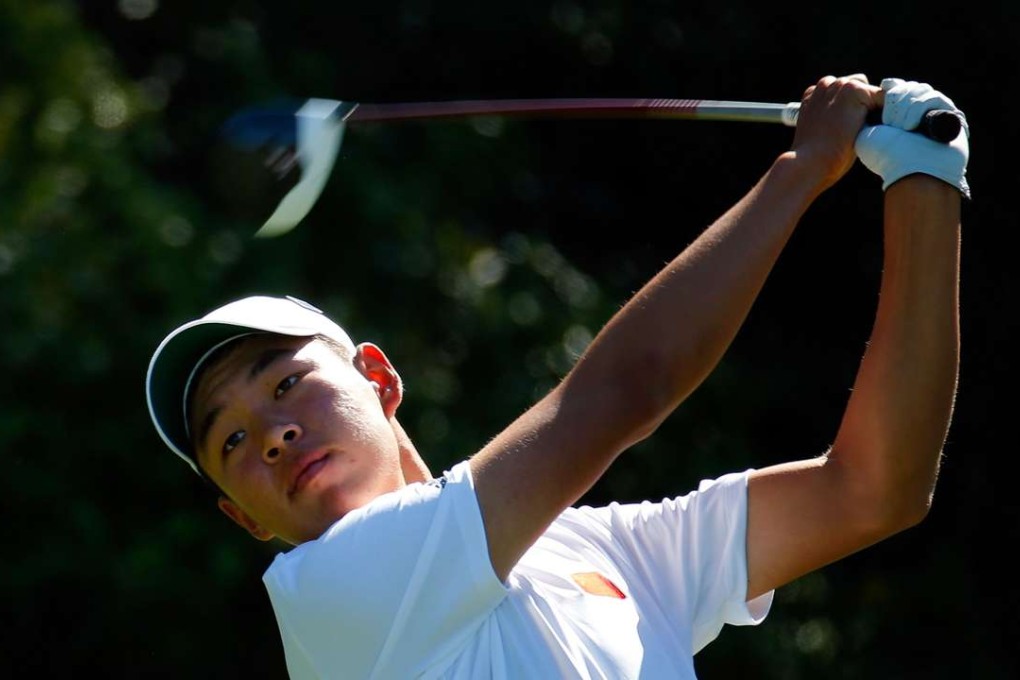 Jin Cheng plays from the 15th tee during a practice round prior to the start of the Masters at Augusta National. Photo: AFP