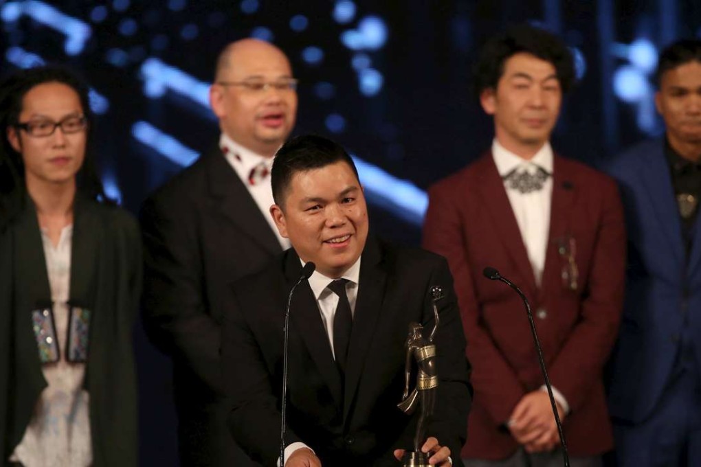 Executive producer Andrew Choi accepts the Best Film crown at the Hong Kong Film Awards. Photo: Reuters