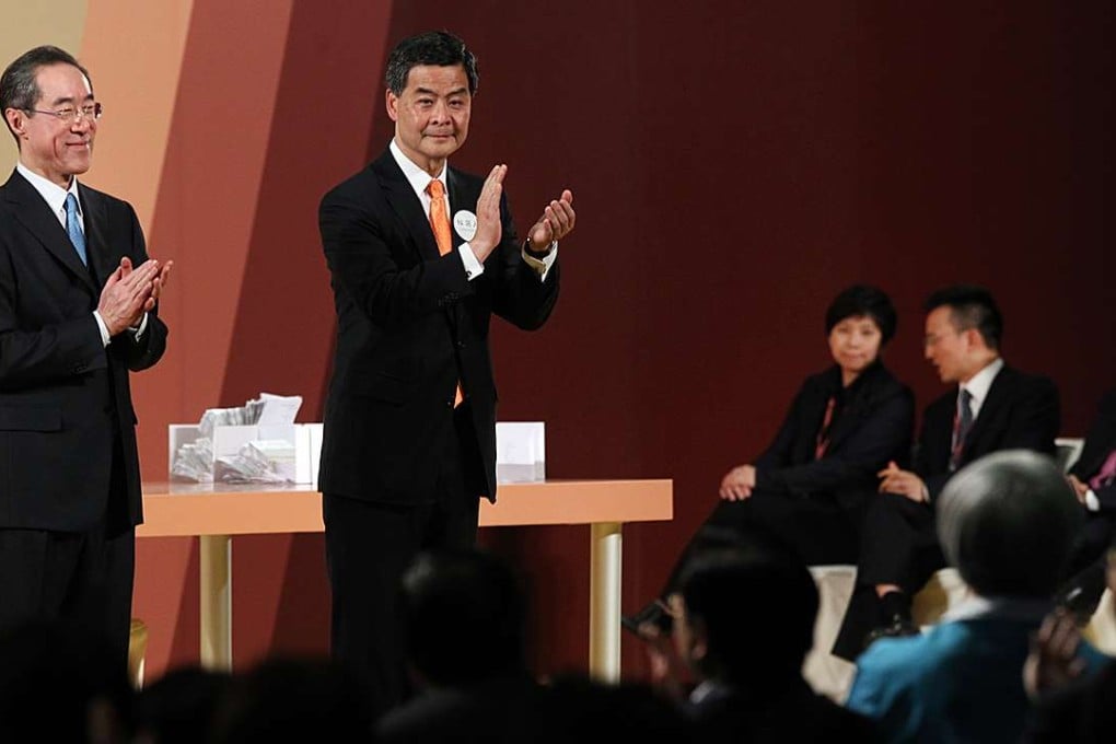 Leung Chun-ying (right) beat Henry Tang in the 2012 chief executive poll. The next will be held on March 26 next year. Photo: Sam Tsang