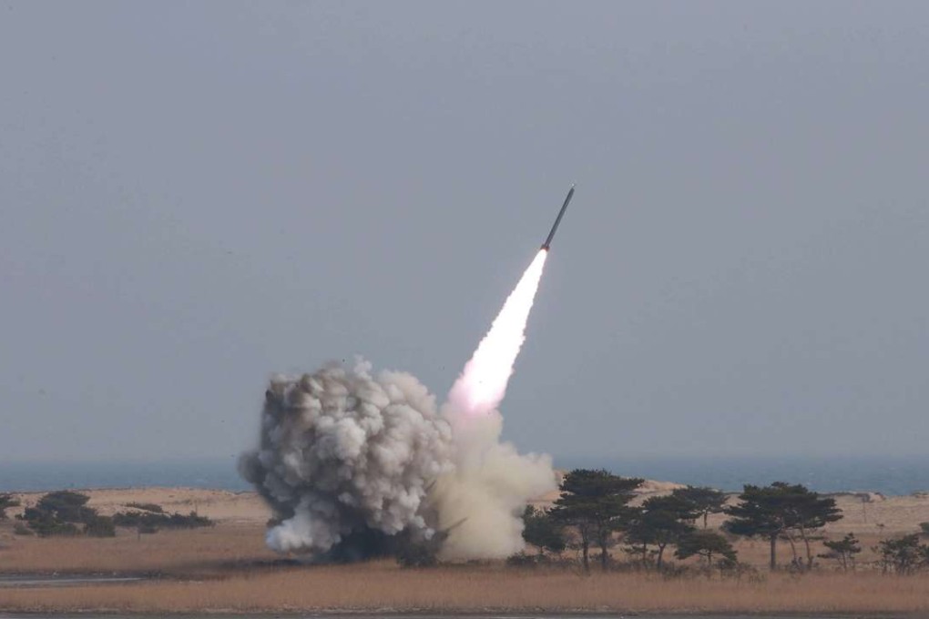 A file photo of North Korean military test firing a rocket system. Photo: EPA