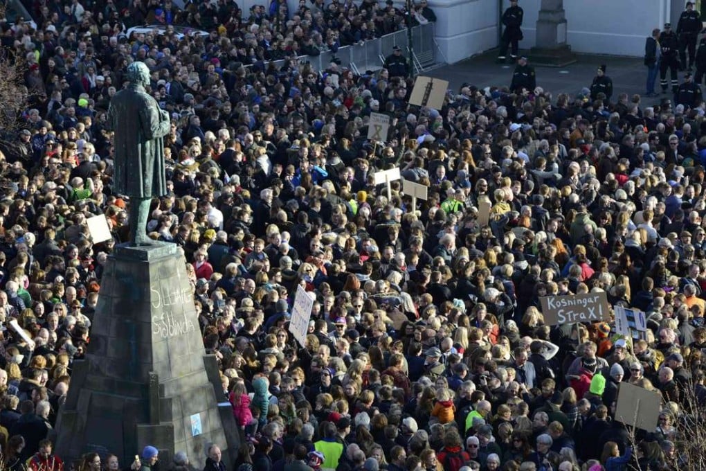 People demonstrate against Iceland's Prime Minister Sigmundur Gunnlaugsson in Reykjavik on Monday. Photo: Reuters