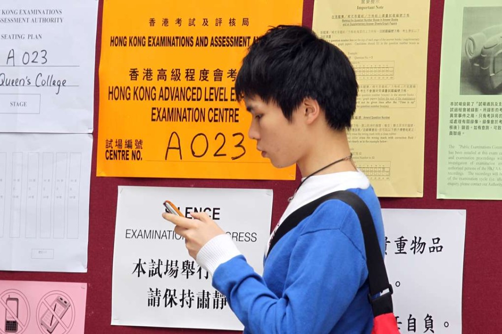 A candidate at a Hong Kong Advanced Level examination centre in Causeway Bay. Photo: Dickson Lee